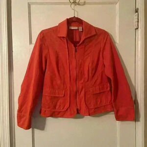 Chicos size zero orange zip up jacket with pockets.
